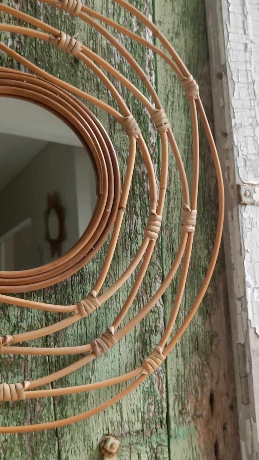 Round rattan mirror