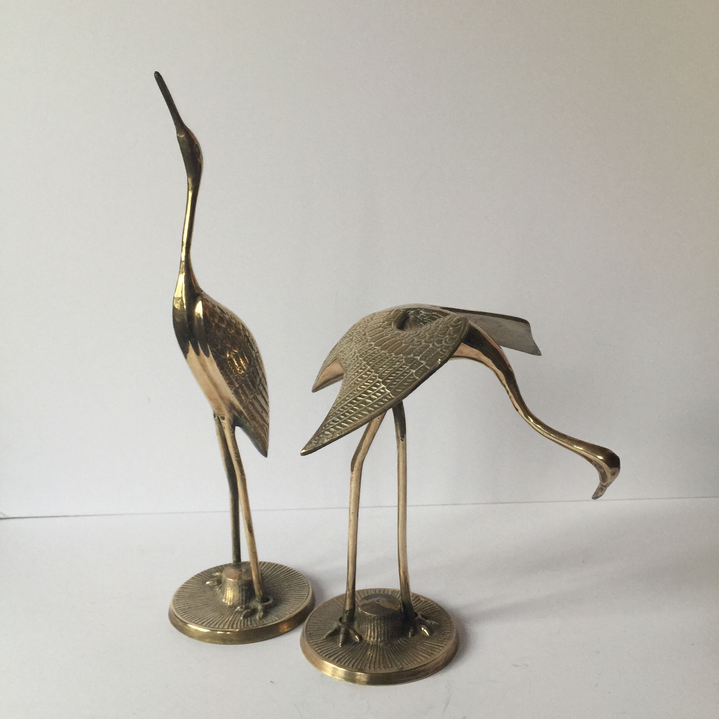 Couple of brass birds