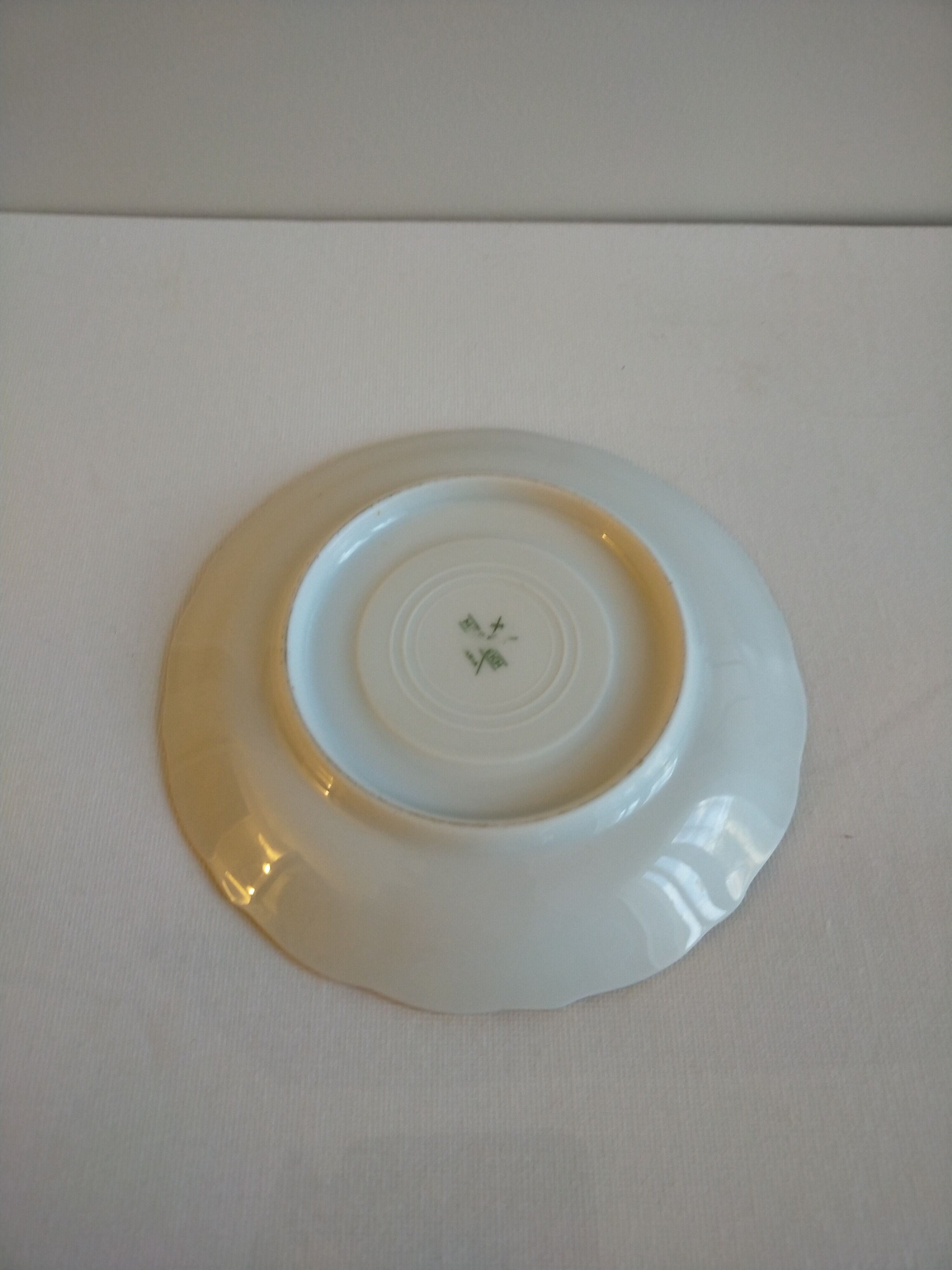 Porcelain cup and under cup