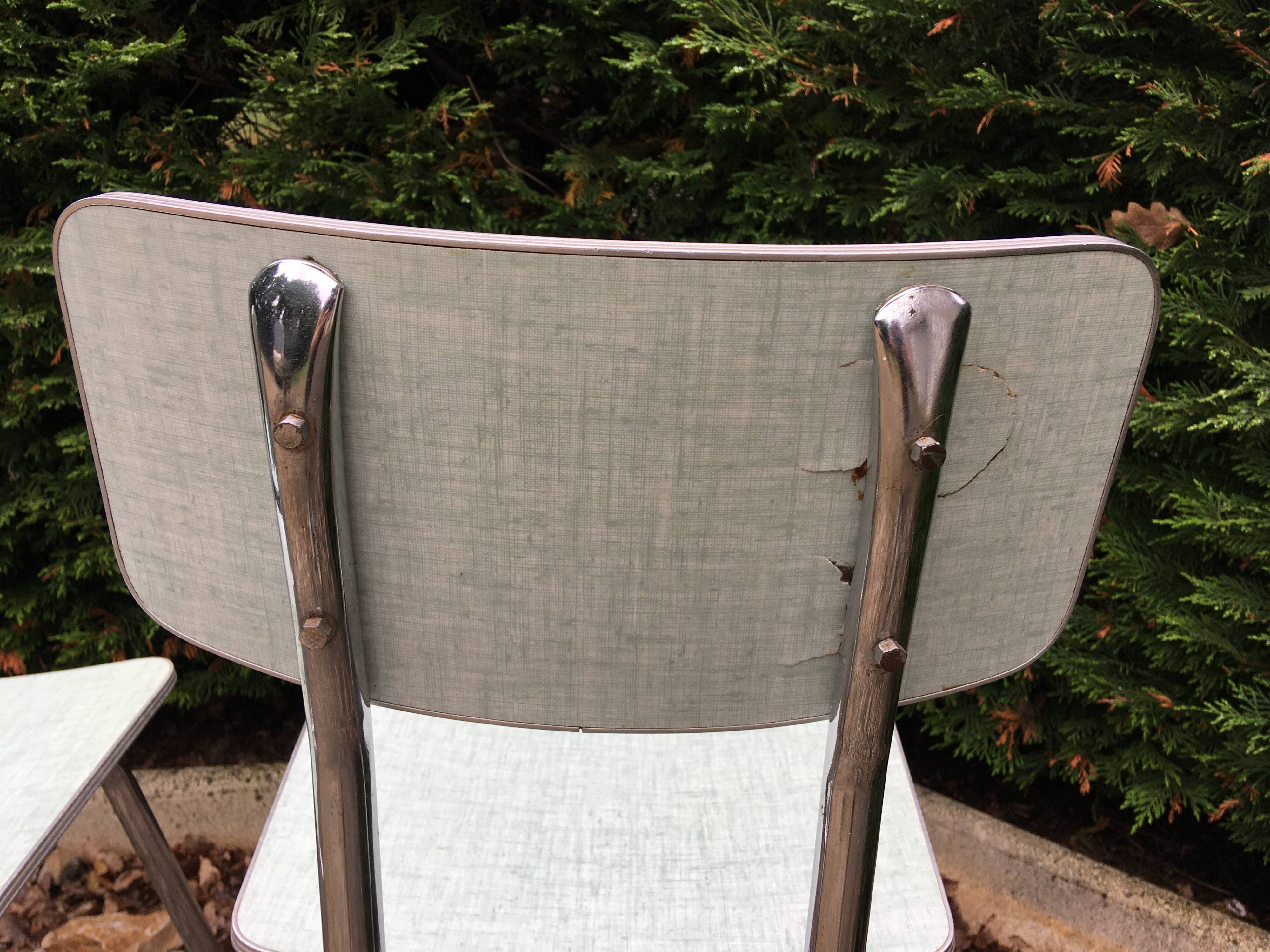 Formica table set with extensions + 4 Plastilux chairs