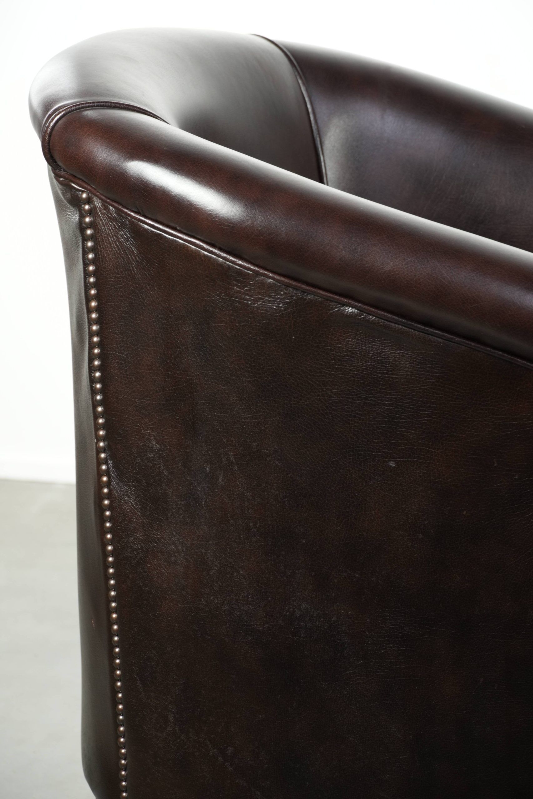 Set of two cowhide club armchairs in good condition with a English design