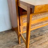 Modernist vintage chest of drawers in light chene has 3 drawers rattan top changing table