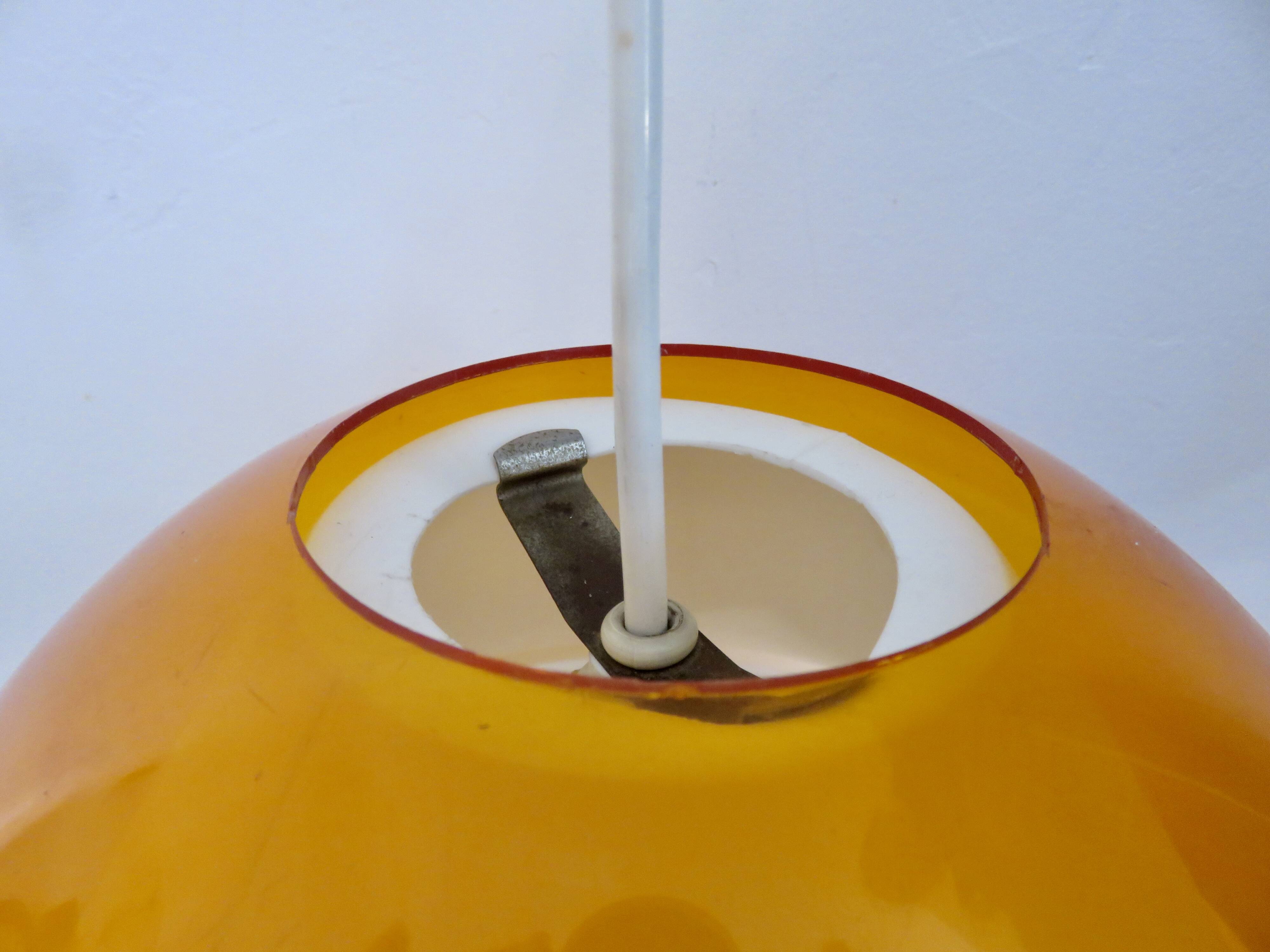 Orange plexiglass pendant light 1970