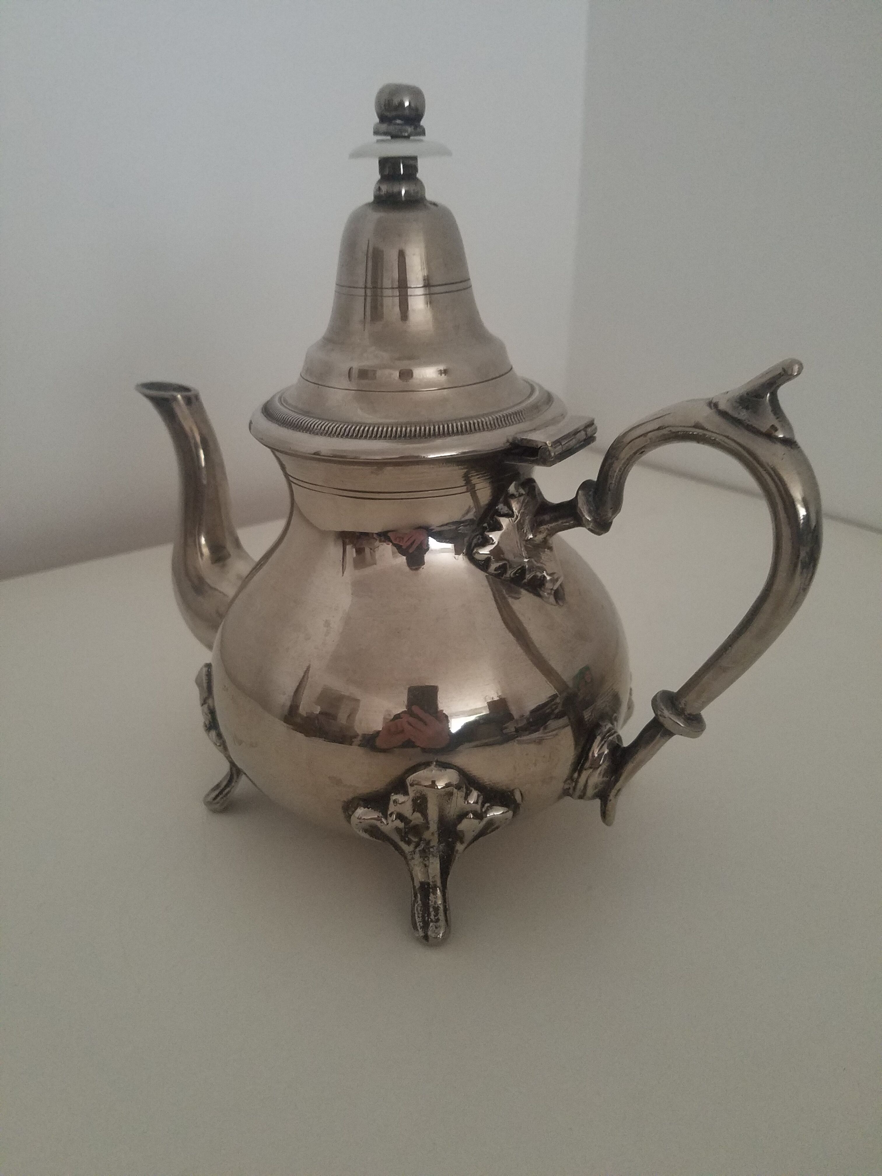Oriental teapot in silver metal