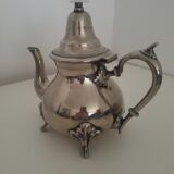Oriental teapot in silver metal