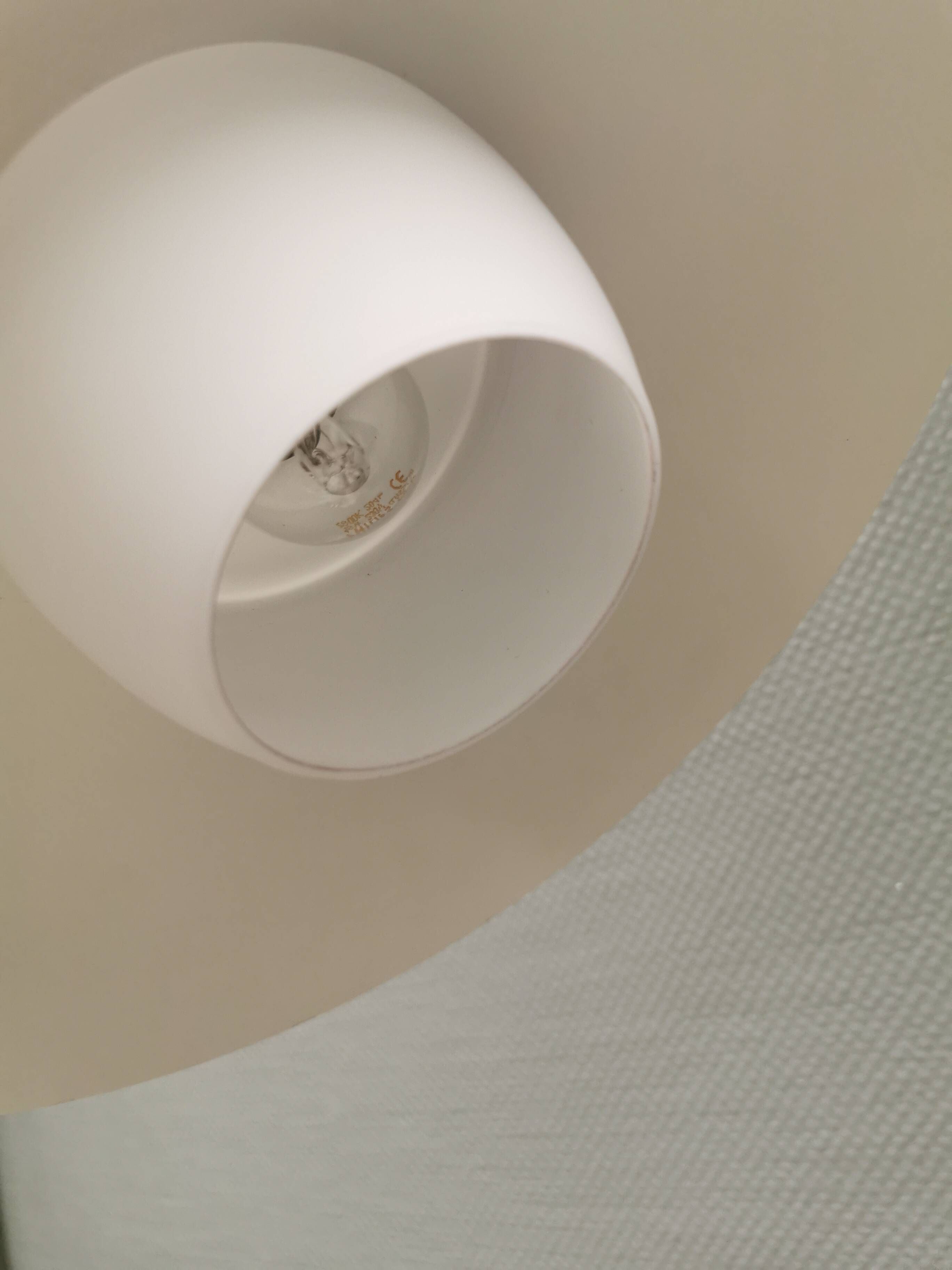 Hanging lamp, from the 1970s in matte white glass and brass colored metal.