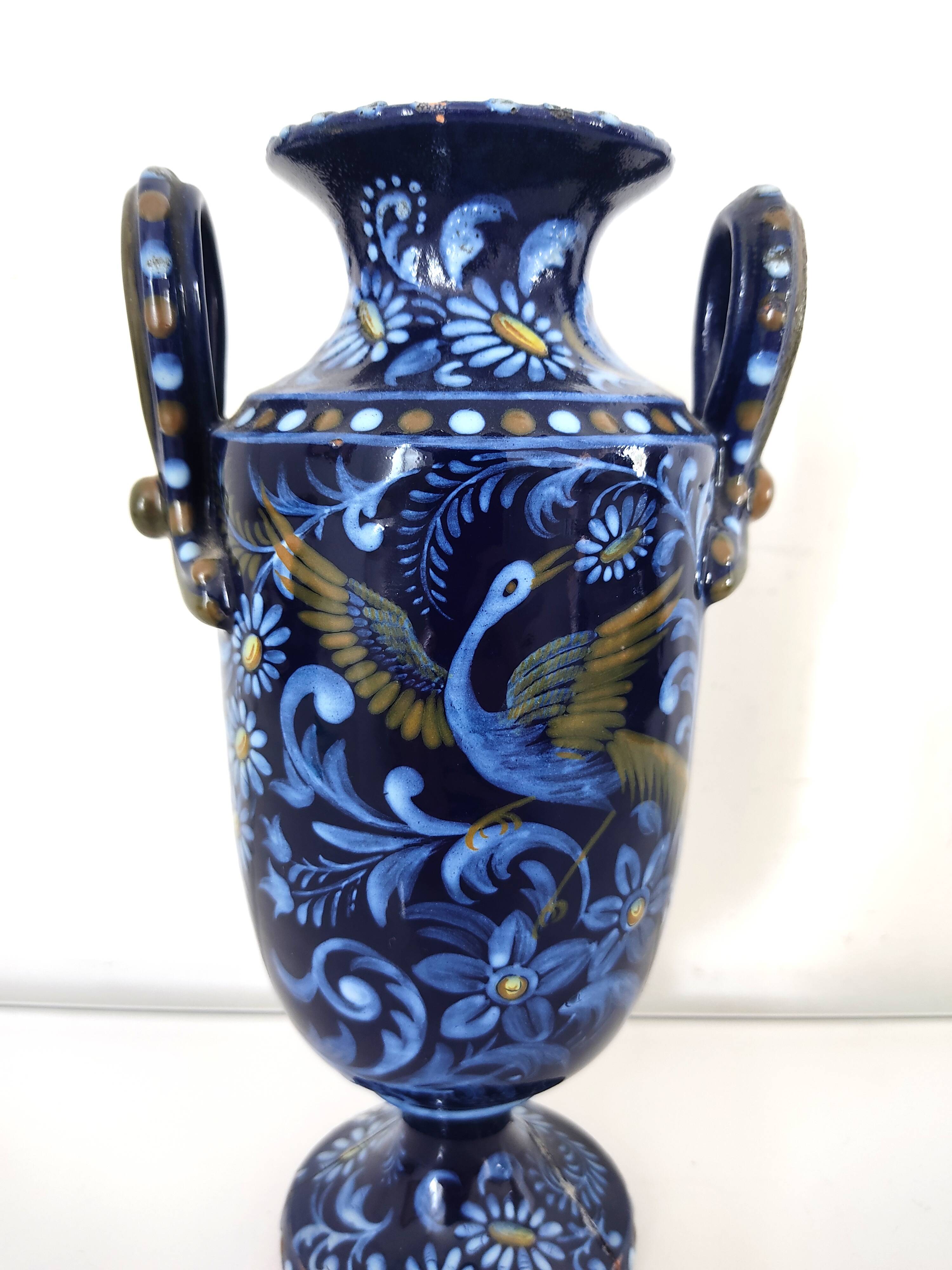 Small blue vase with birds