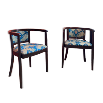 Restored art deco style armchairs, newly upholstered in high quality French jacquard fabric.