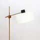 Floor lamp with a swivelling arm