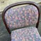 Scandinavian chair in curved solid teak wood and fabric.