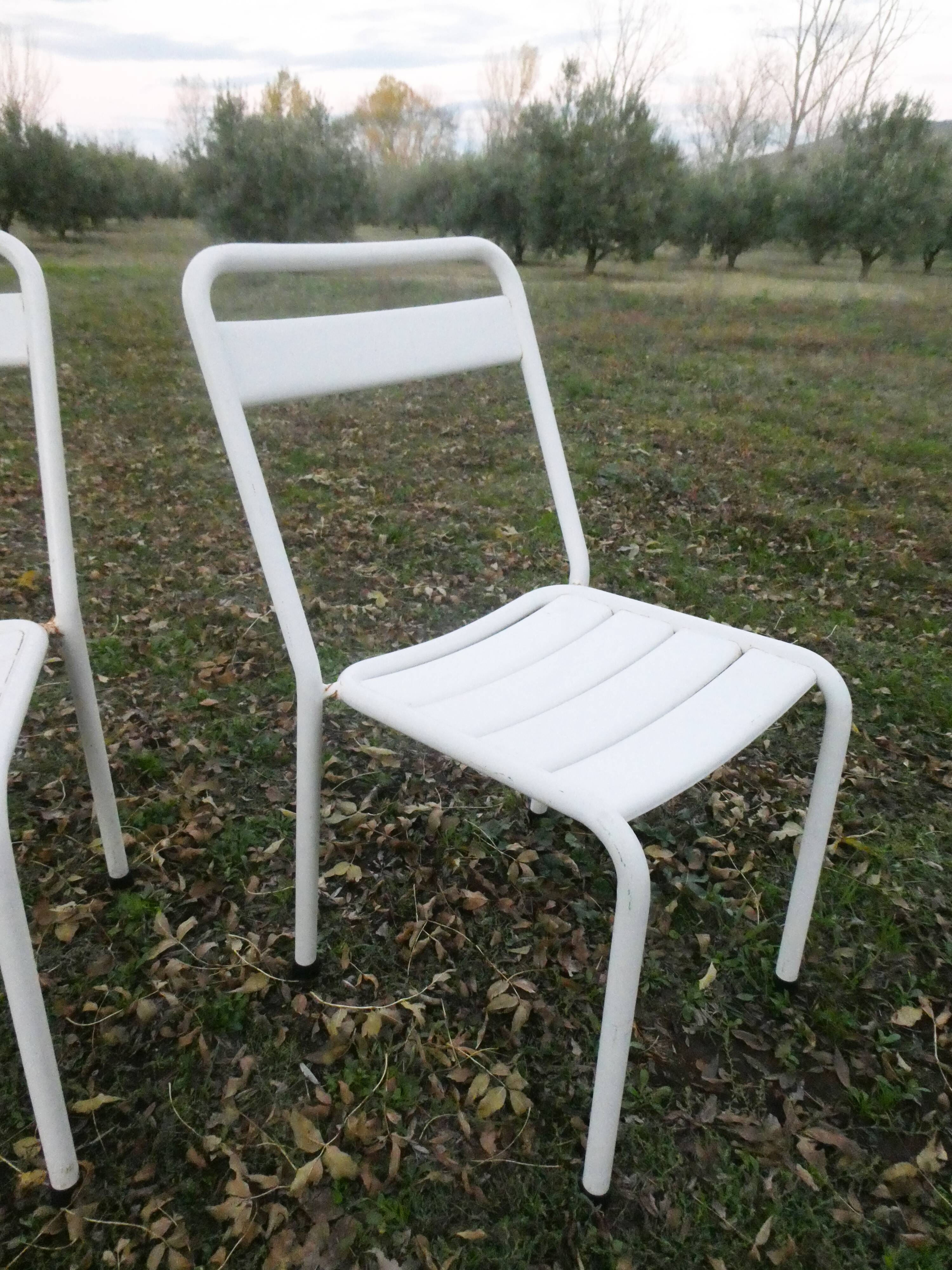 Duo of bistro style indus terrace chairs