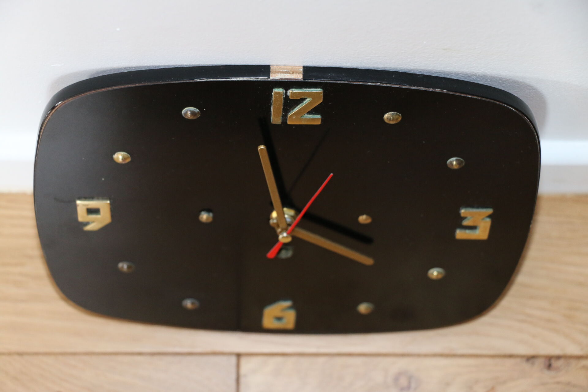 Brass and formica wall clock