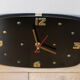 Brass and formica wall clock