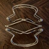 Chrome metal trivet by Tomado Holland