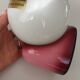 Pair of Tissot wall lights from the 70s with pink opaline glass in space age style.