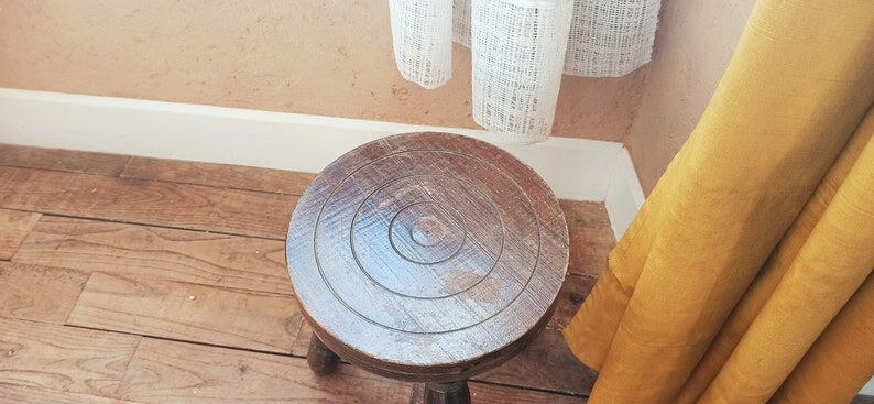 Wooden tripod stool