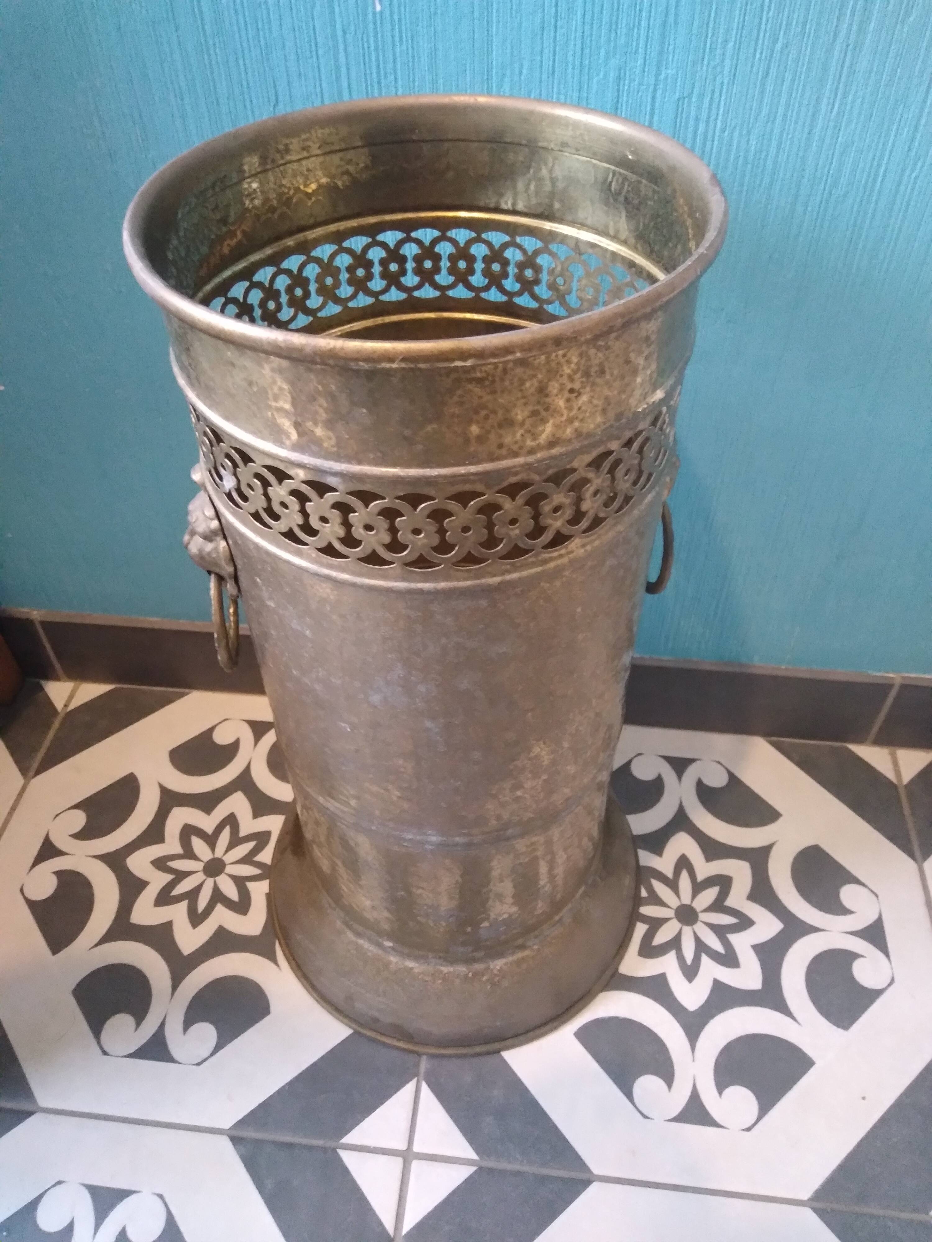 Brass umbrella stand with lion's head