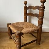 Low straw chair