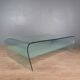 Curved glass coffee table