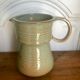 Jug and its vintage stoneware glasses