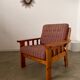 Old vintage Scandinavian design pine armchair from the 70s