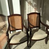 Pair of armchairs with a canned back