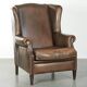 Large sheepskin wingback armchair with beautiful warm colours