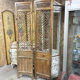 Set of 2 Vietnamese panels with geometric lattice.