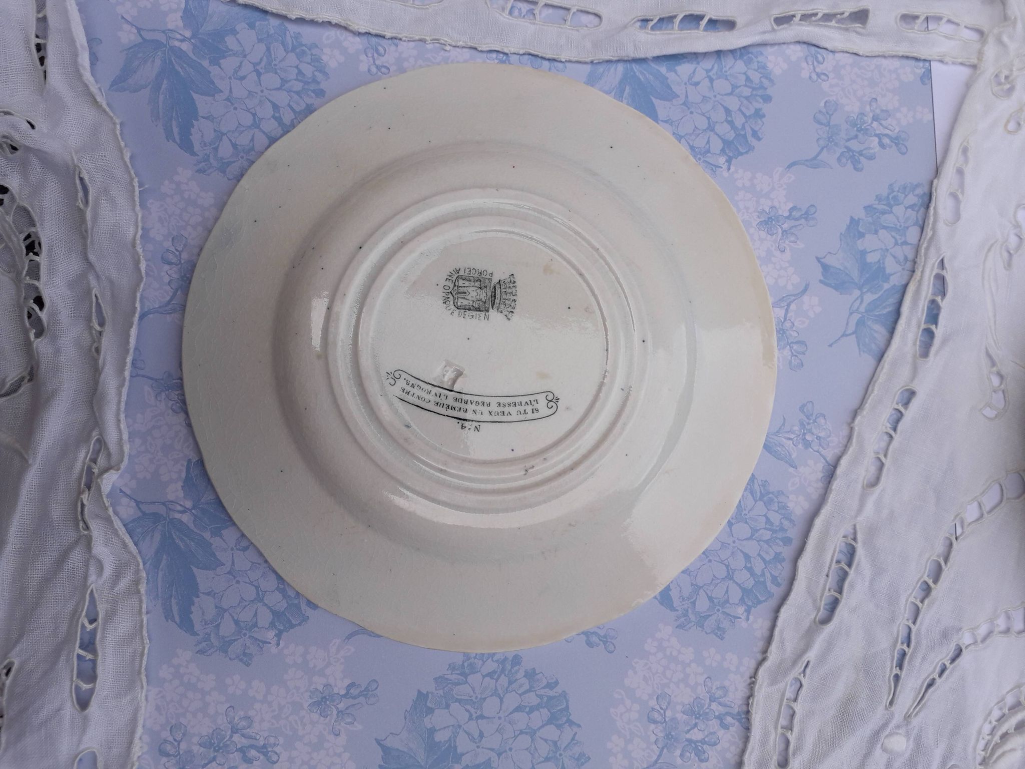 Old plate in Gien opaque porcelain