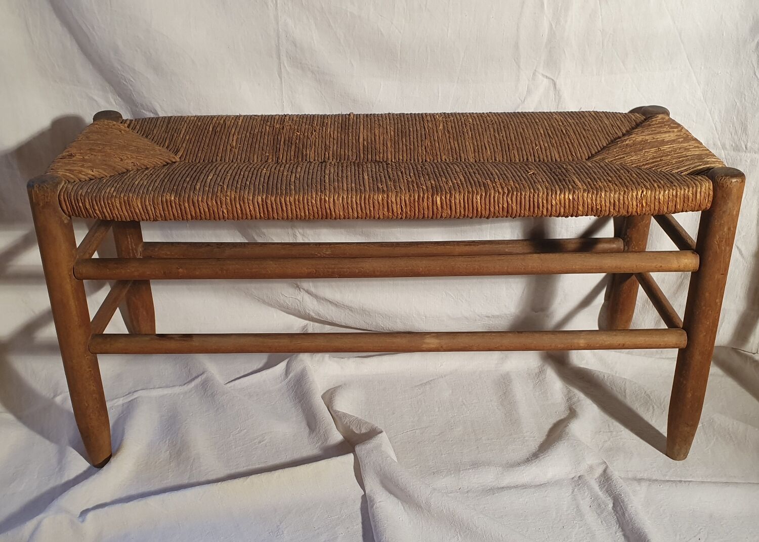 Wood and straw bench
