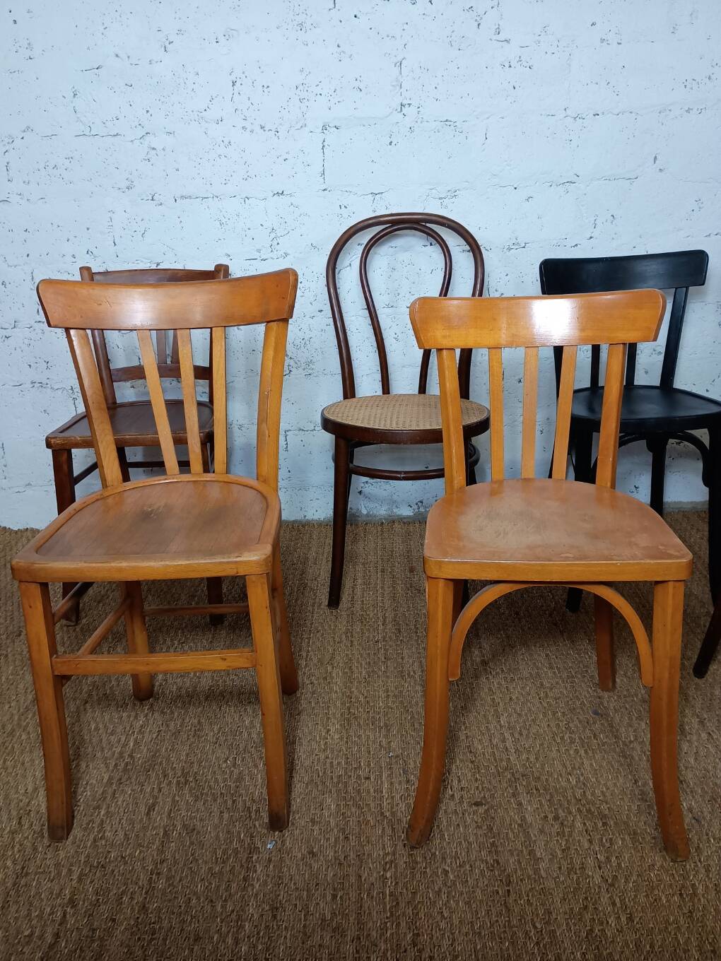 Set of 8 mismatched vintage bistro chairs