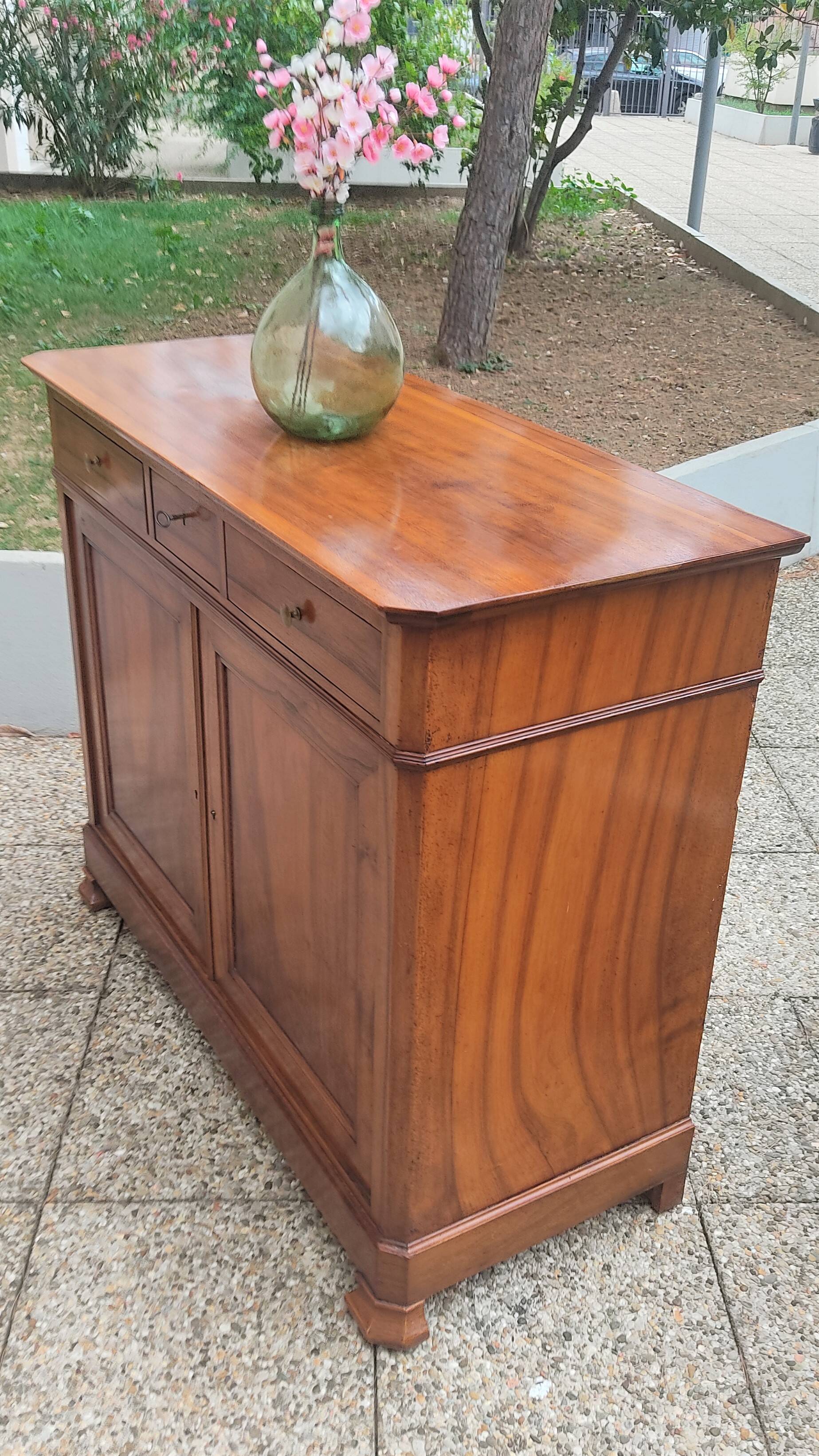 Solid walnut sideboard of the Napoleon III period, late nineteenth century, Louis Philippe style