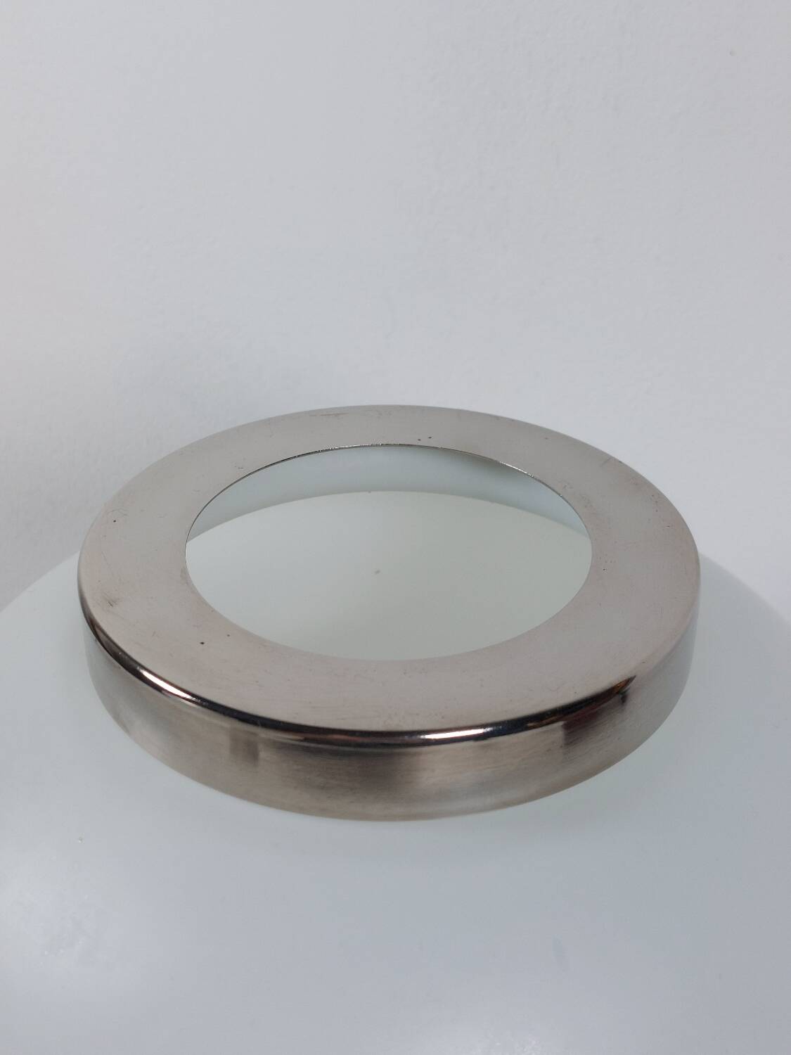 Pair of vintage futuristic style table lamps in chrome and opal glass.