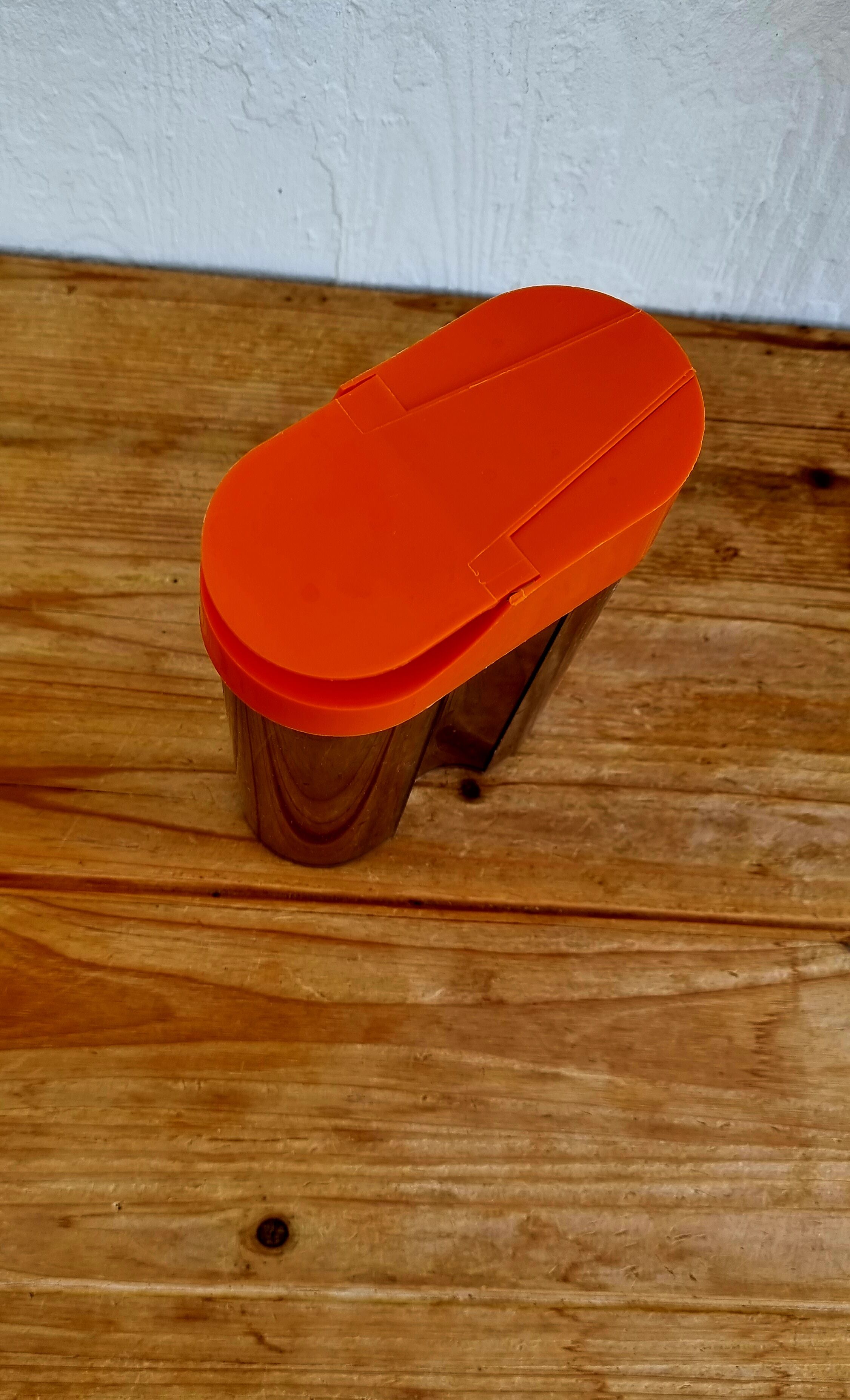Orange plastic pouring box