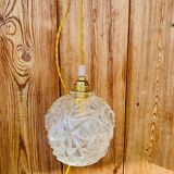Globe pendant light in chiseled glass