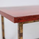 Table basse en laque et fer doré. Années 1950.