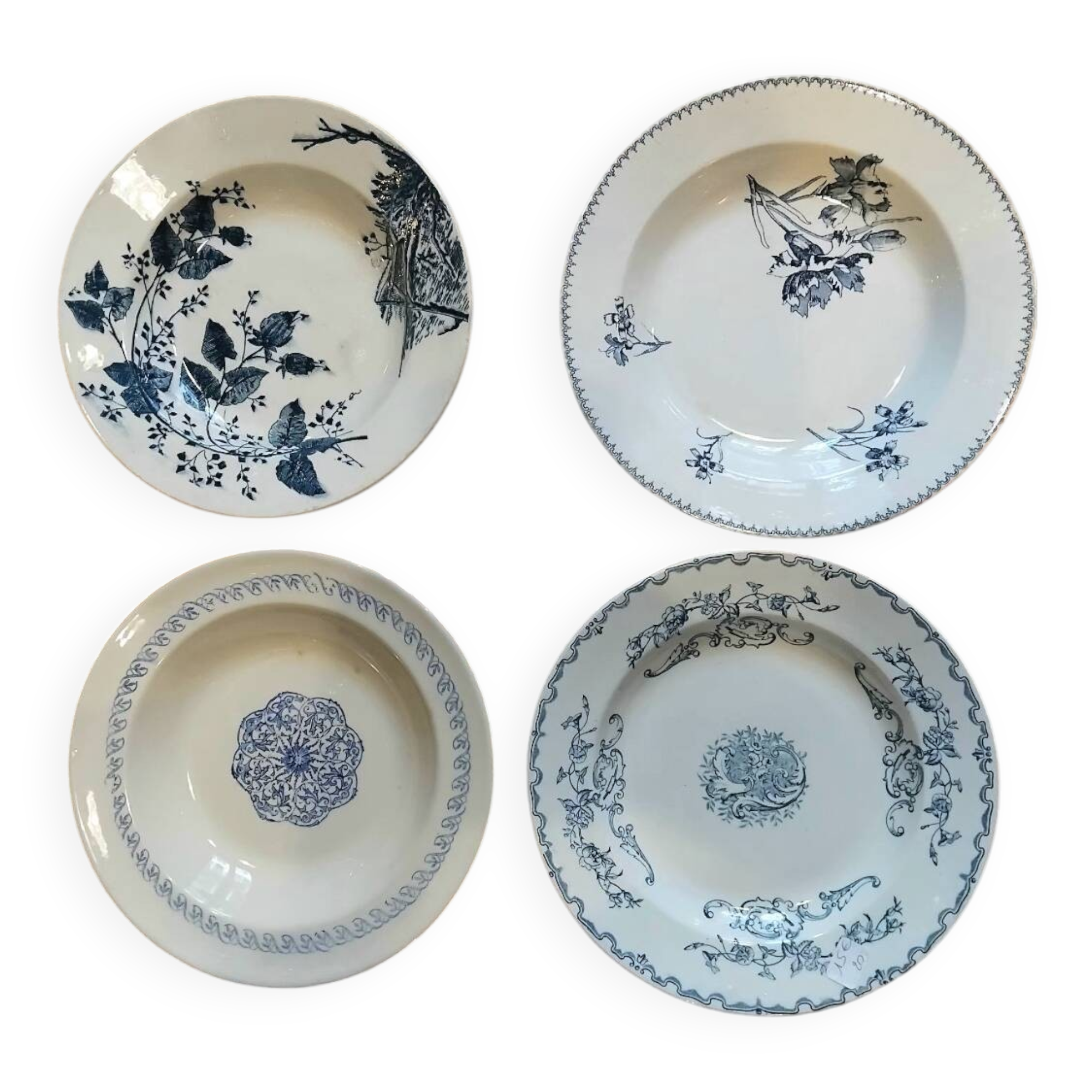 Set of 4 mismatched blue Terre de Fer soup plates