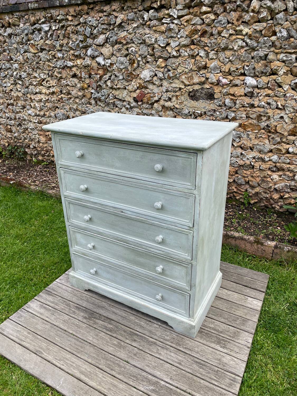 Vintage chest of drawers with white patina