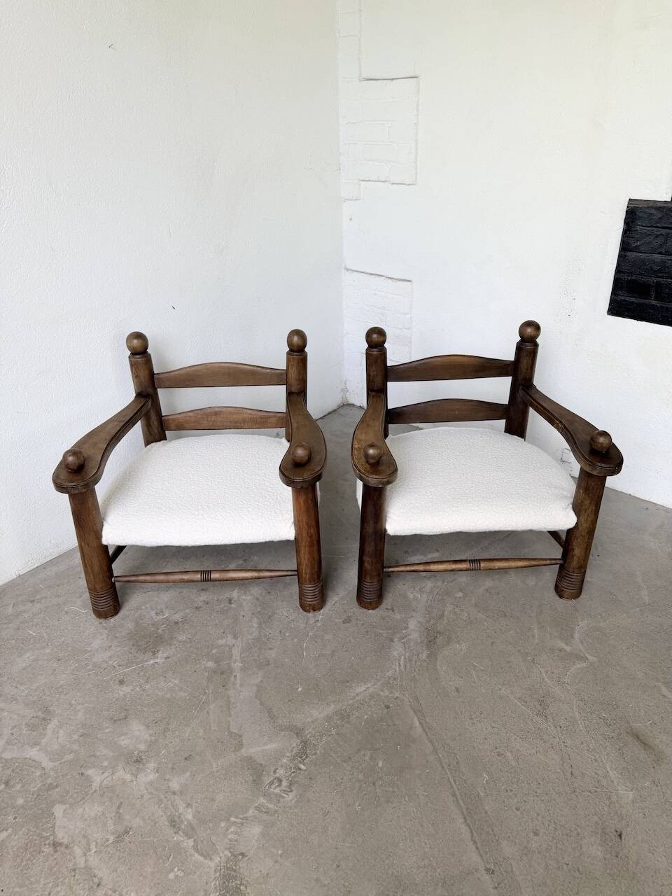 Pair of Dudouyt armchairs from the 1950s, oak.