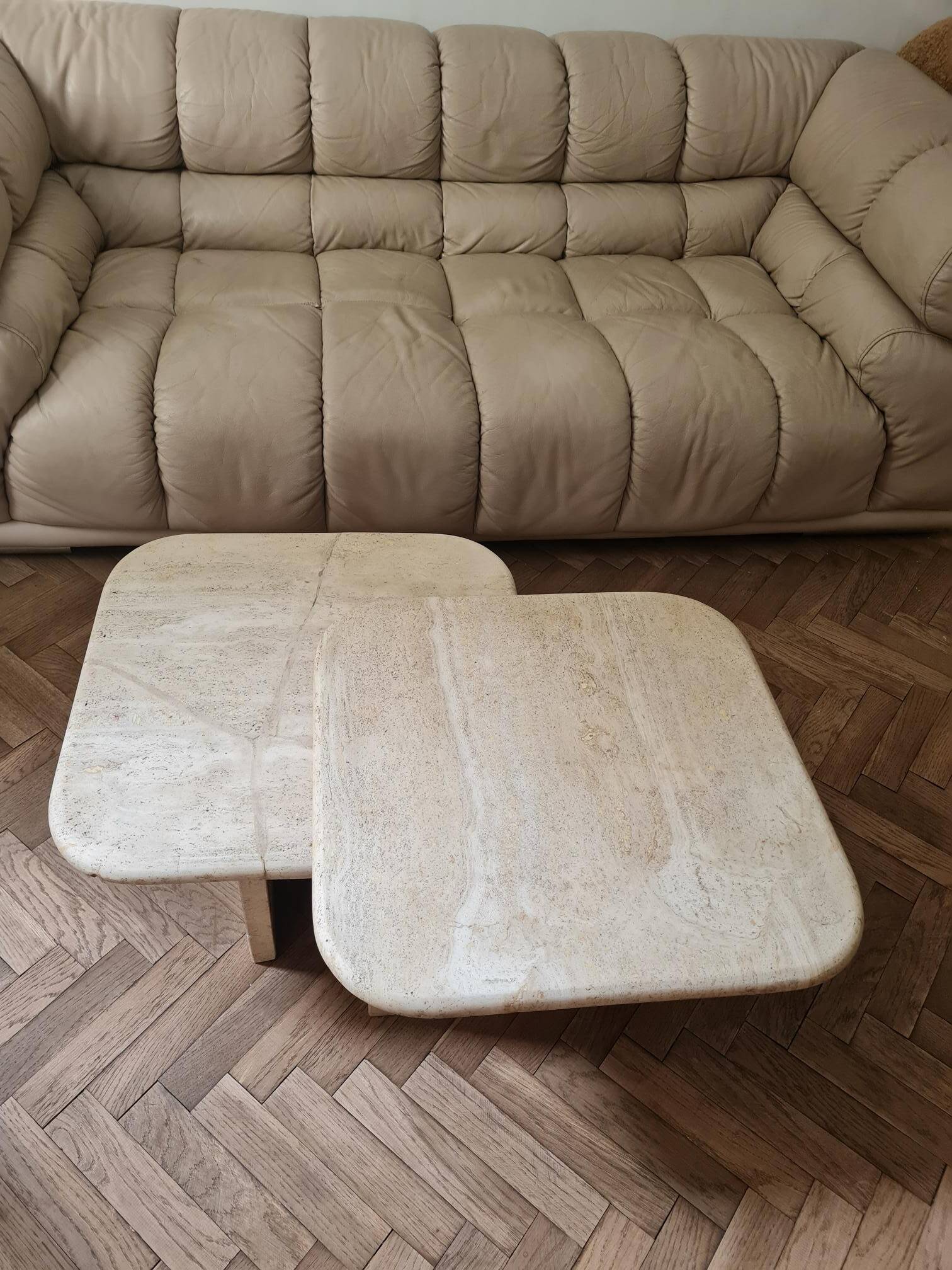 Pair of travertine nesting tables