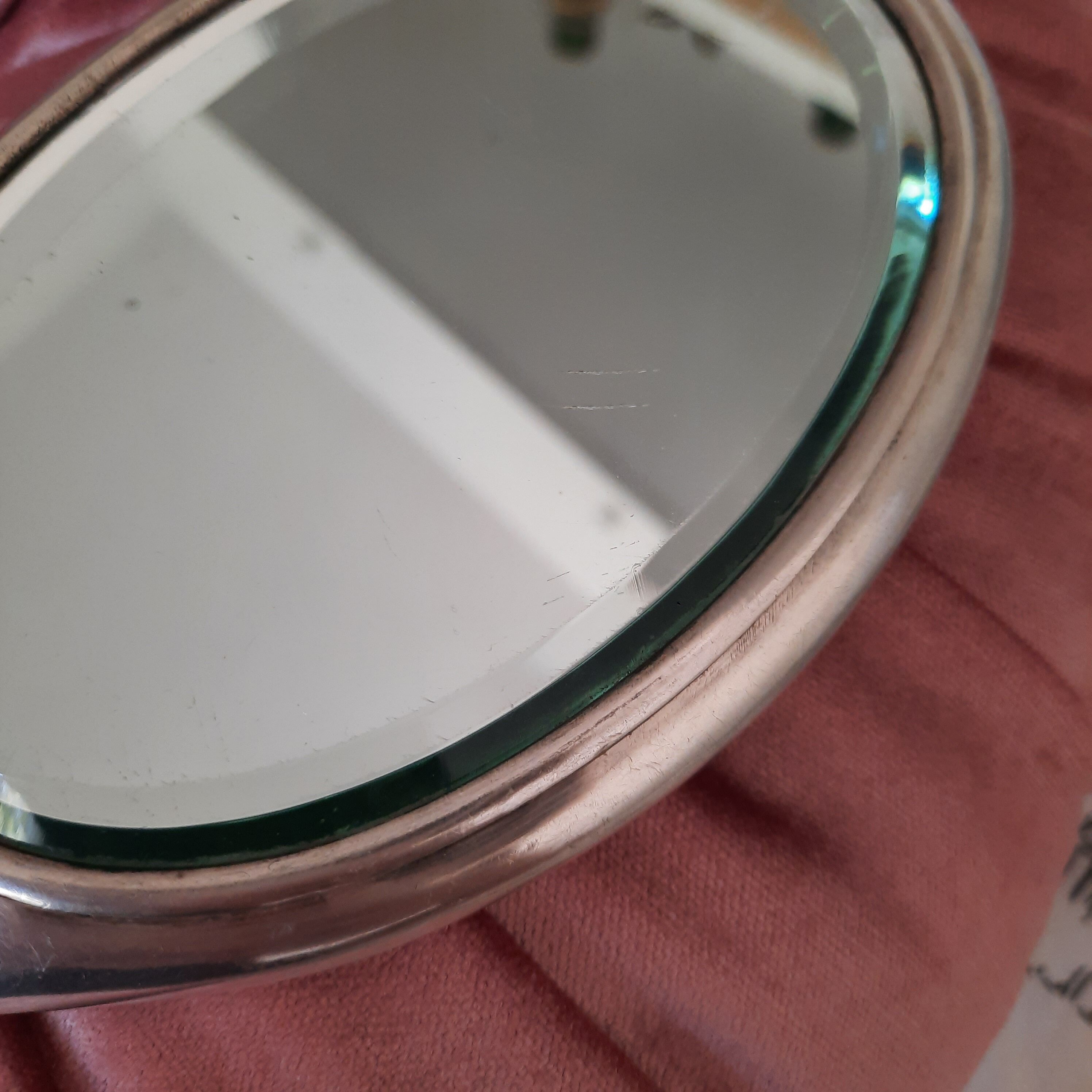 Art Deco hand-facing in silver metal and beveled mirror, circa 1930