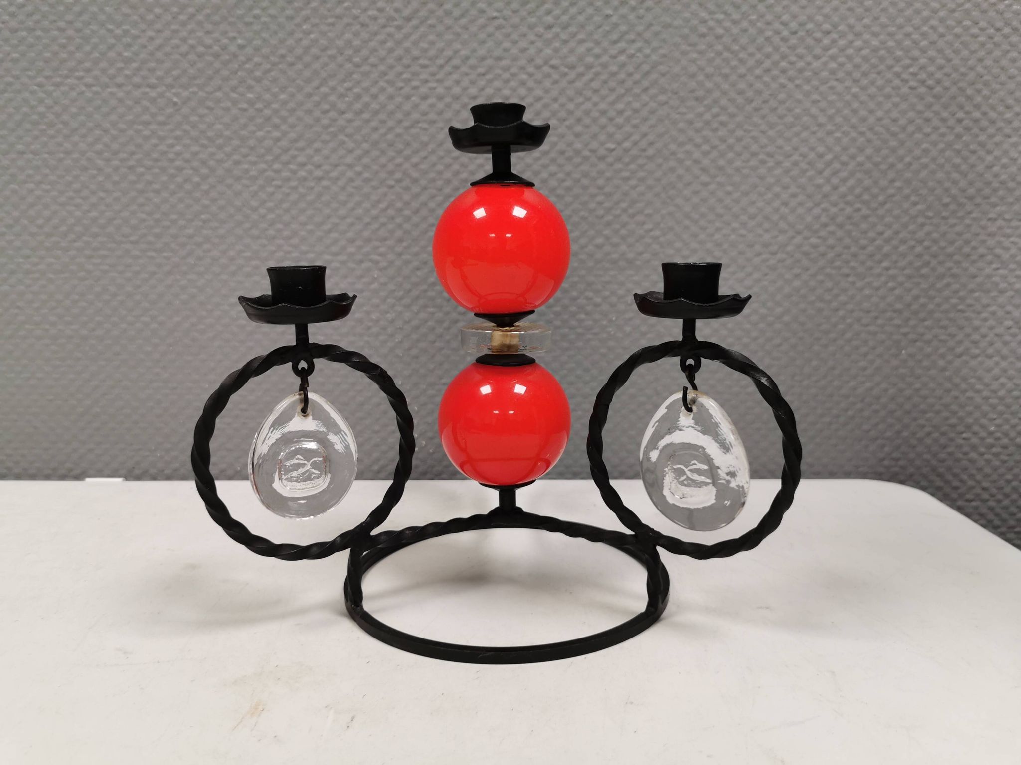 Wrought iron candle holder for 4 candles. by Erik Höglund in the 1960s