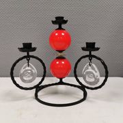 Wrought iron candle holder for 4 candles. by Erik Höglund in the 1960s