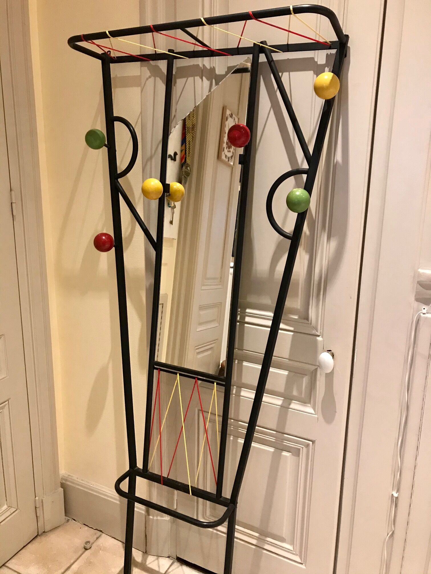 60s wall dressing room door, with colorful balls