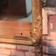 Miroir de style Louis XV en bois doré XXème