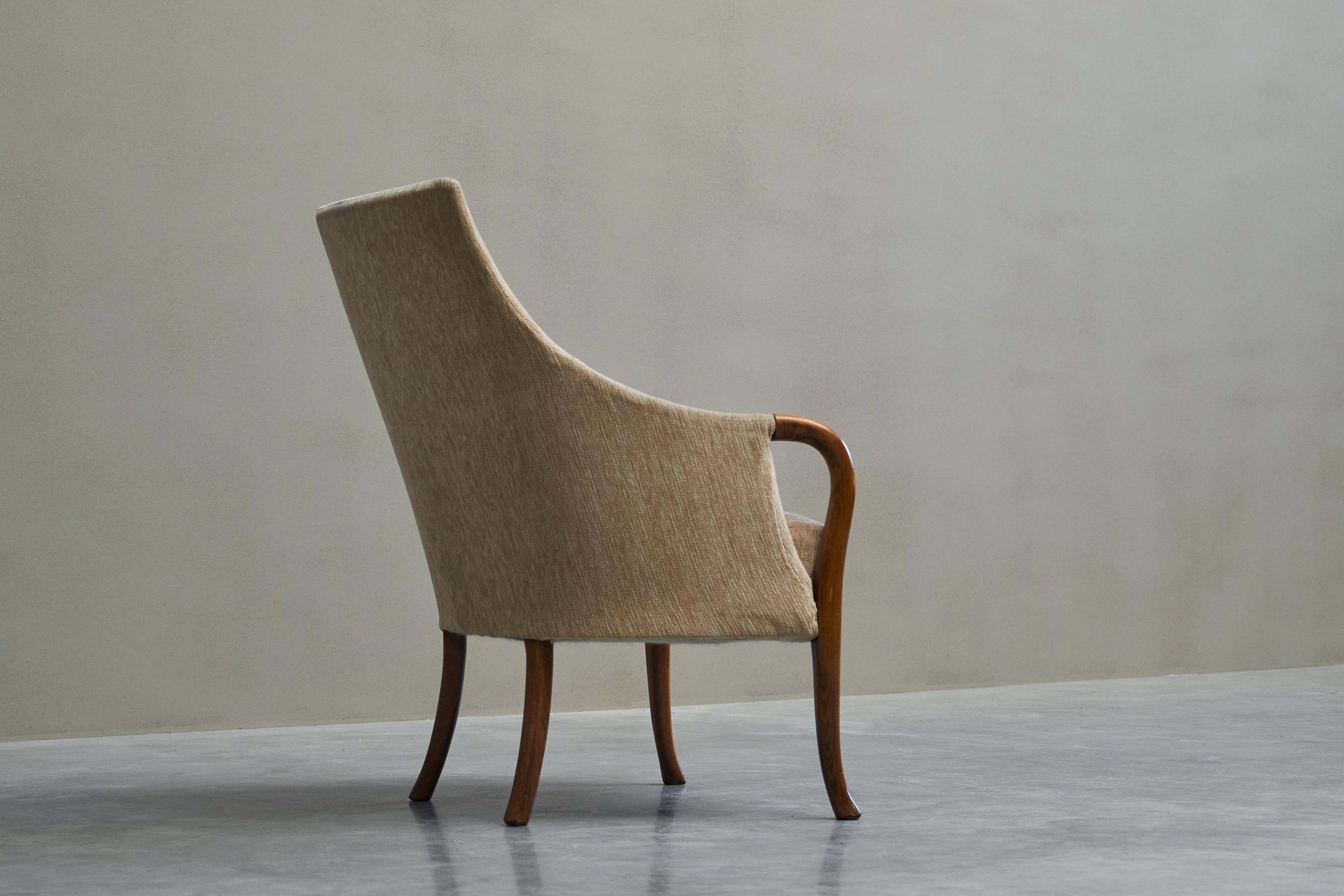 Mid-Century armchair in wool and beech, 1950s