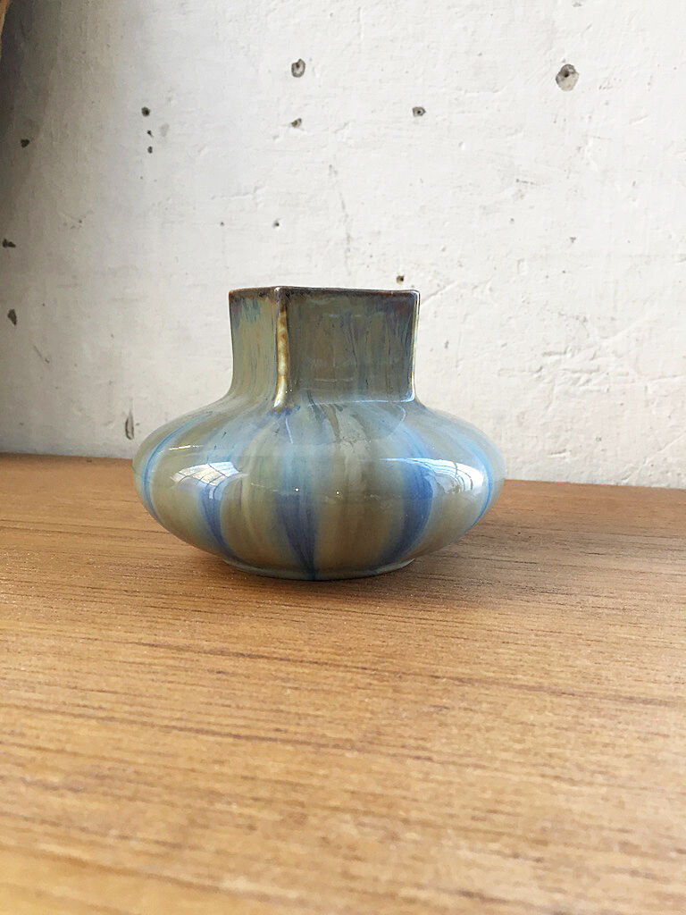 Small blue ceramic vase