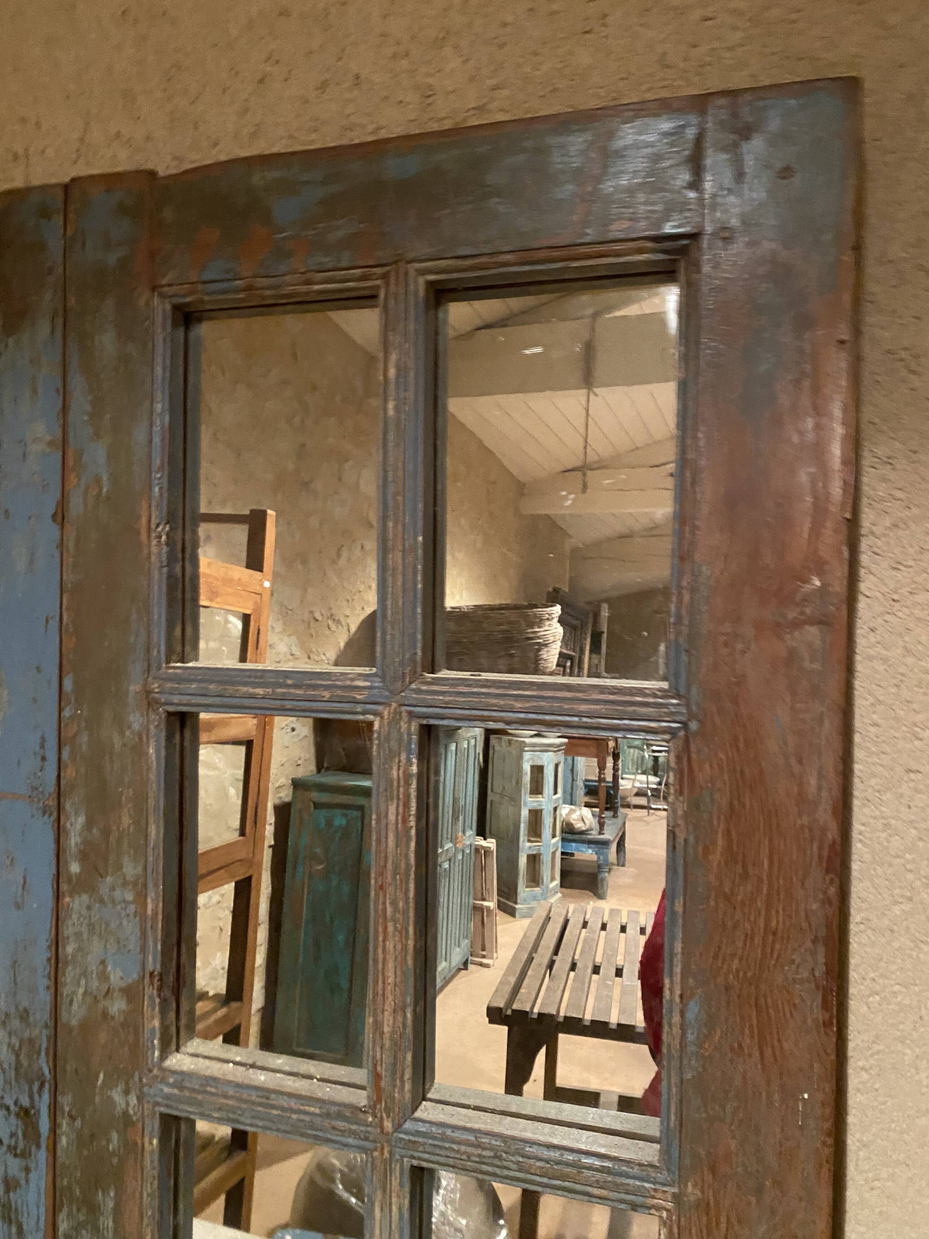 Indian door forming a mirror