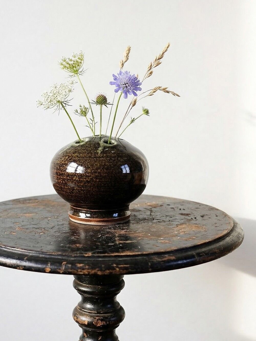 Brown and green glazed stoneware flower holder, vintage craftsmanship from the 1970s-1980s.