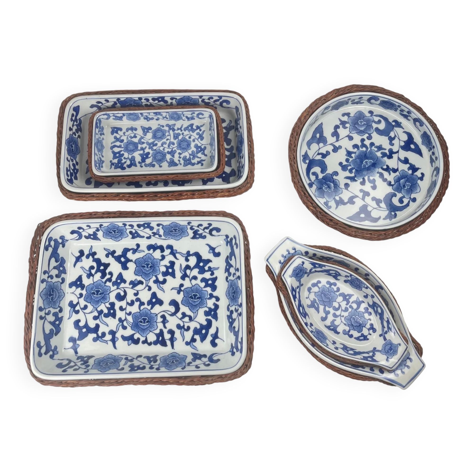 Set of 6 ceramic presentation plates in white and blue, floral pattern with woven wicker frame, 1970s/80s.